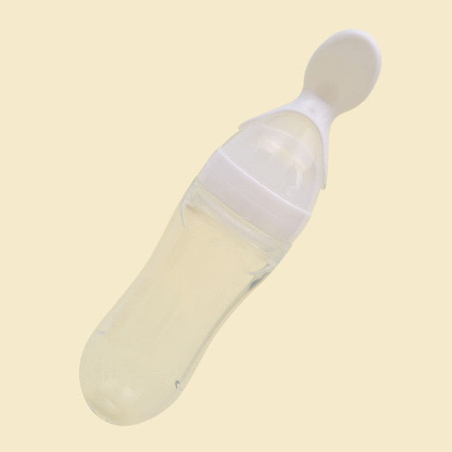 Infant Baby Squeezing Feeding Bottle With Spoon